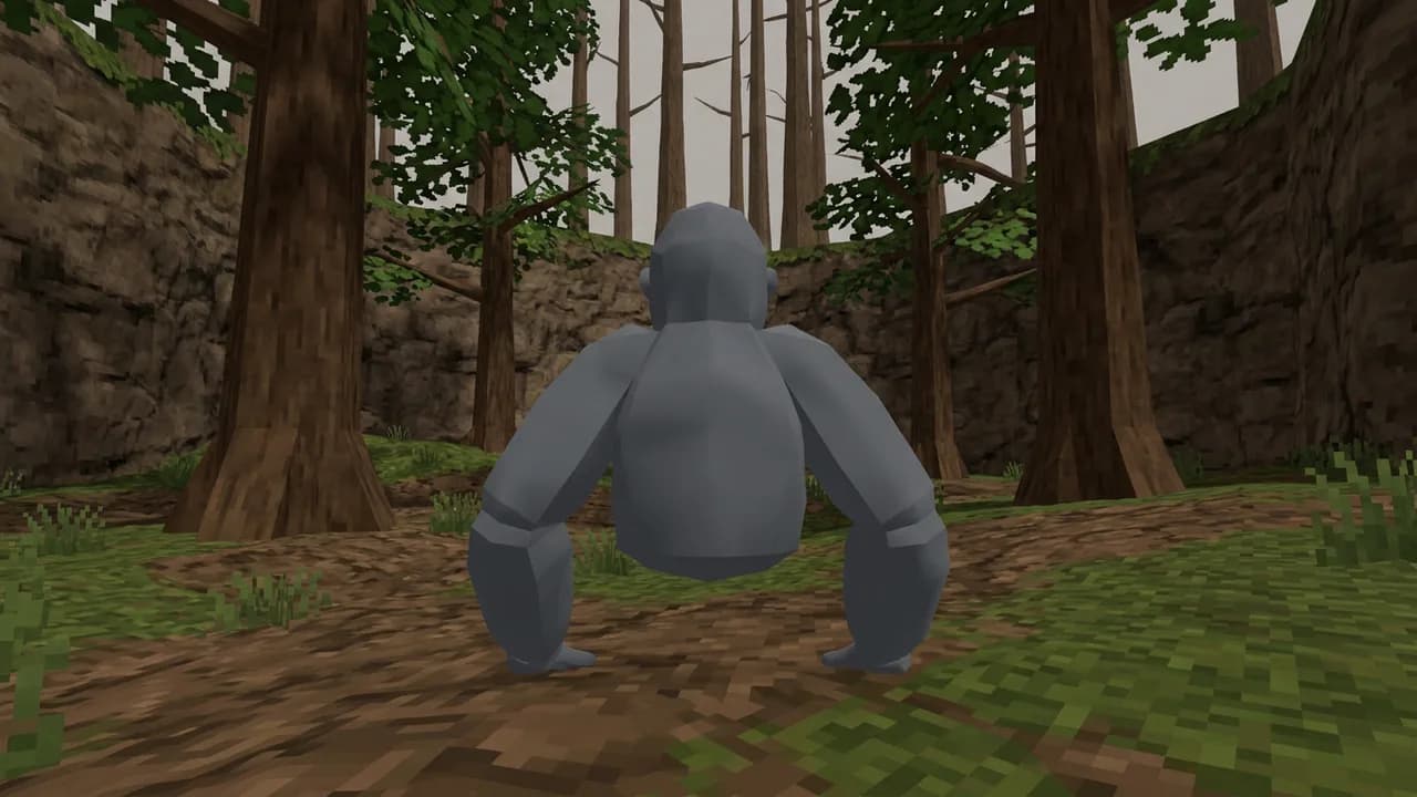 A plain grey gorilla seen from behind in the default Gorilla Tag forest